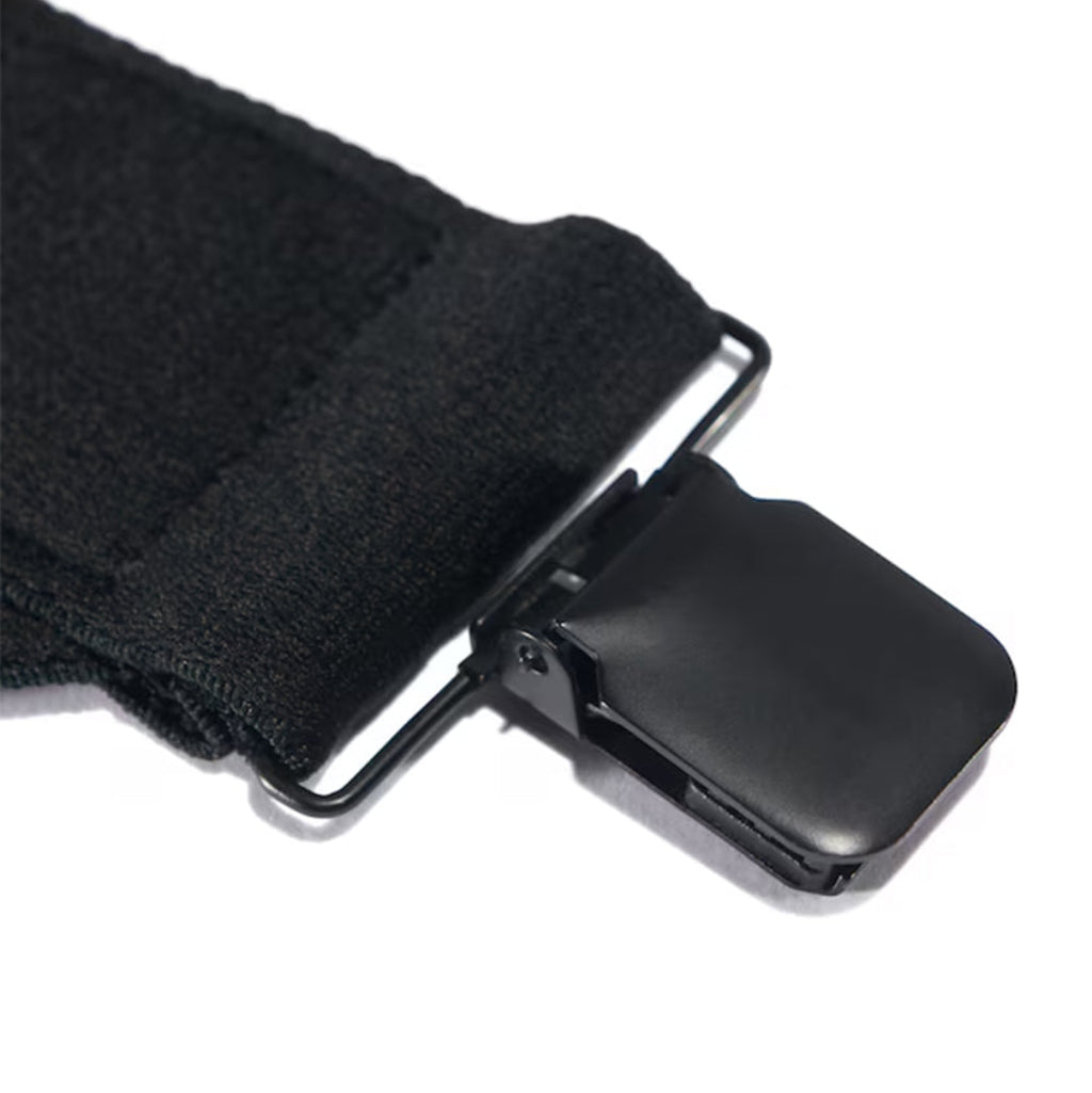 Black belt with a metal buckle on a white background