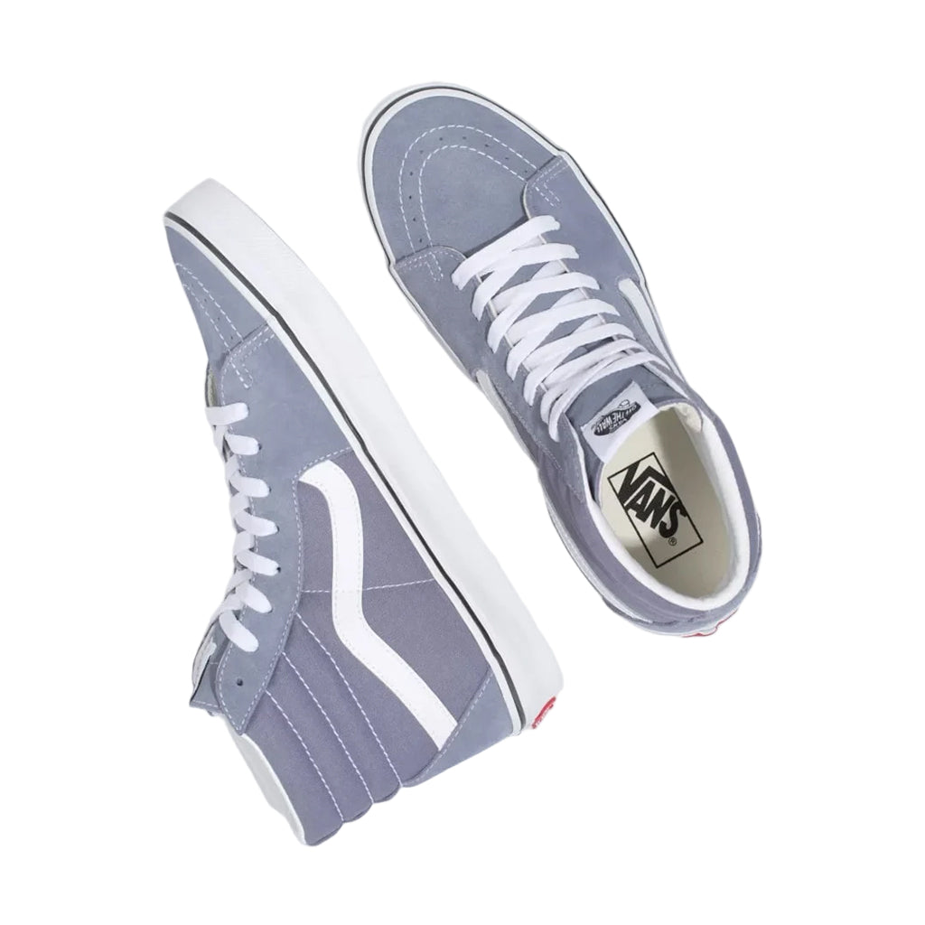 Pair of gray Vans sneakers on a white background