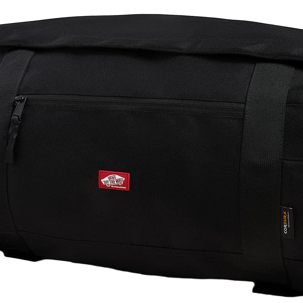 Black duffel bag with a red label on a white background
