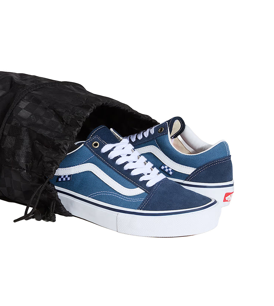 Blue sneakers with white stripes on a black background