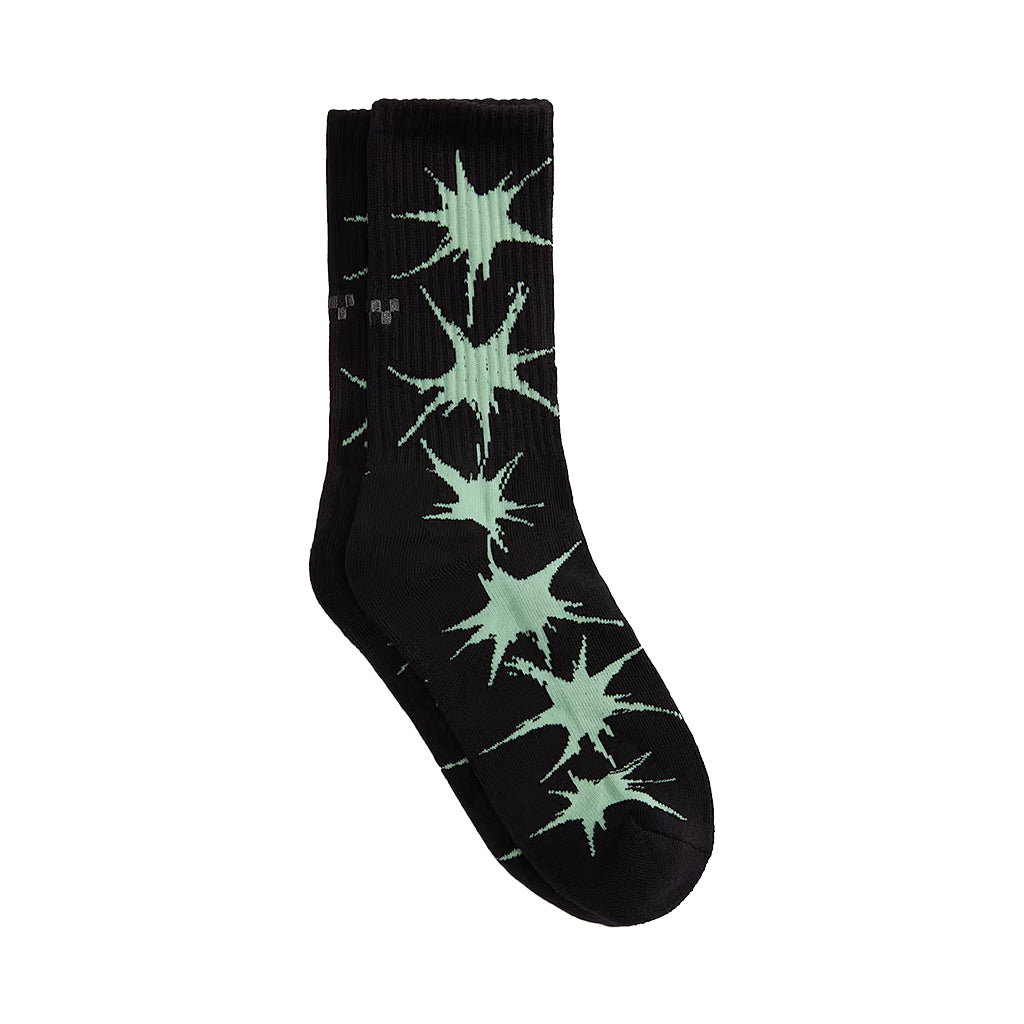 Black sock with green starburst pattern on a white background