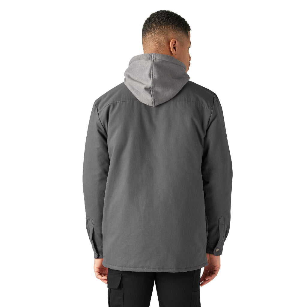 Person wearing a gray jacket with a hood on a white background
