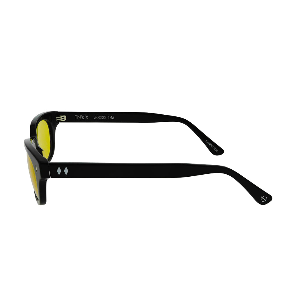 Black sunglasses with yellow lenses on a white background