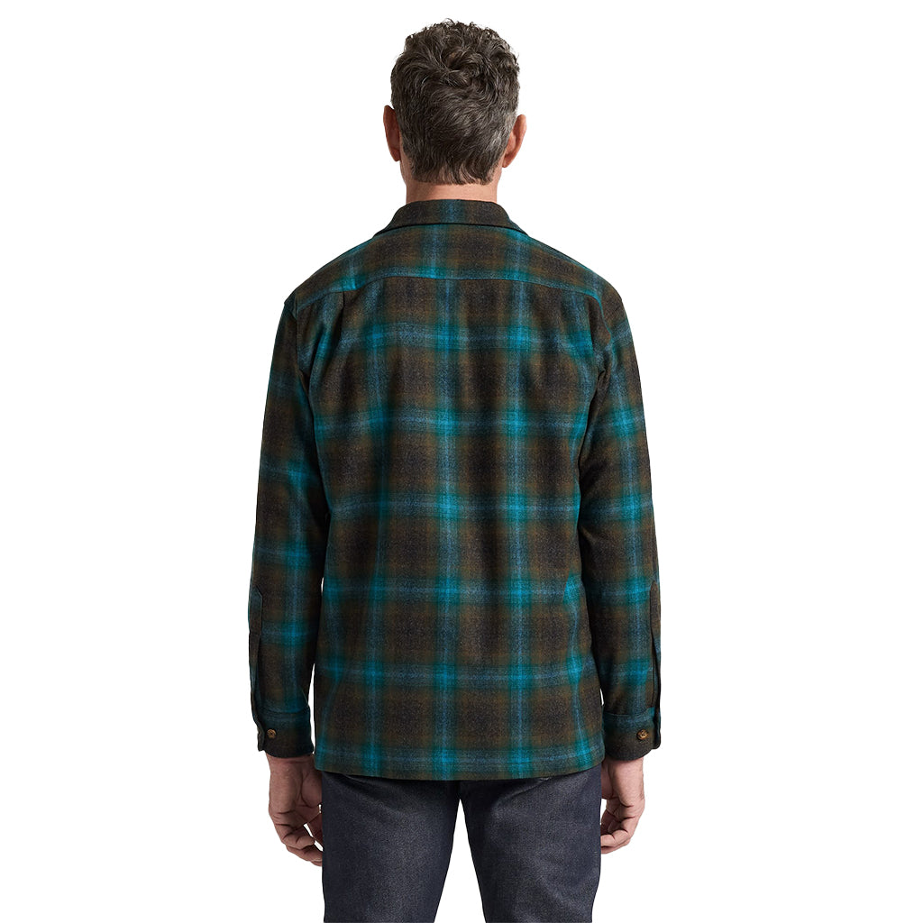 Man wearing a plaid shirt on a white background