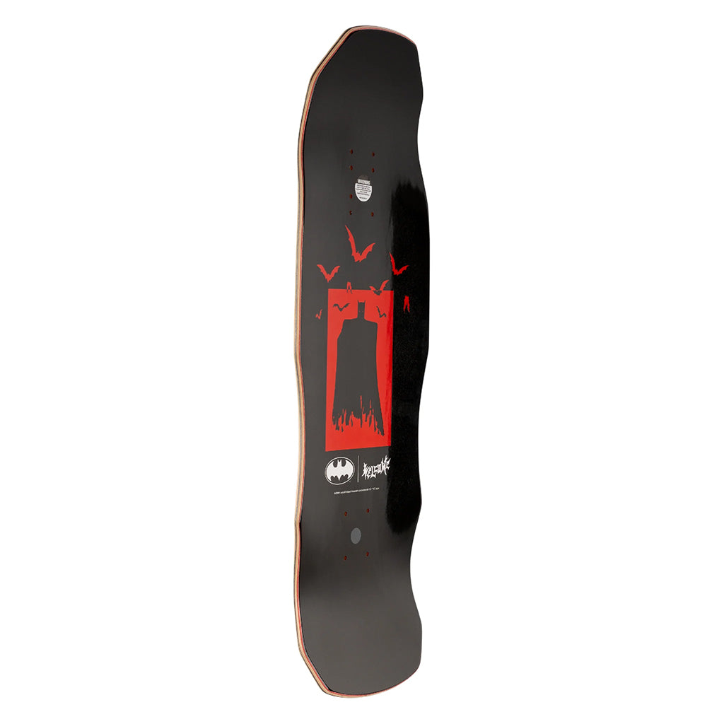 Skateboard deck with a red and black design on a white background