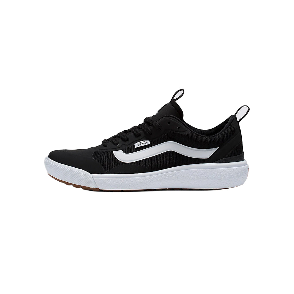 Black and white sneaker with a visible brand logo on a white background