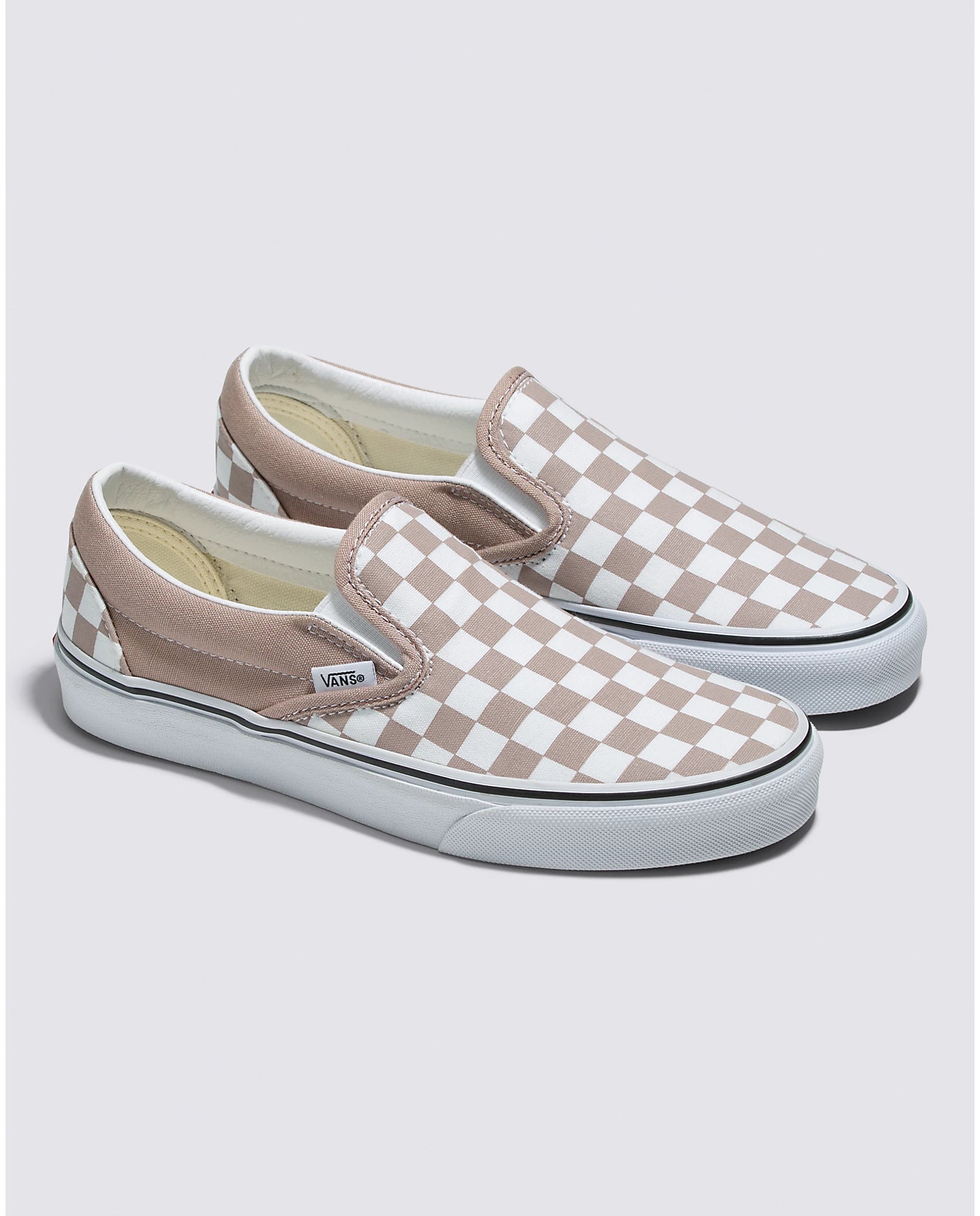 White checkerboard vans slip ons hotsell