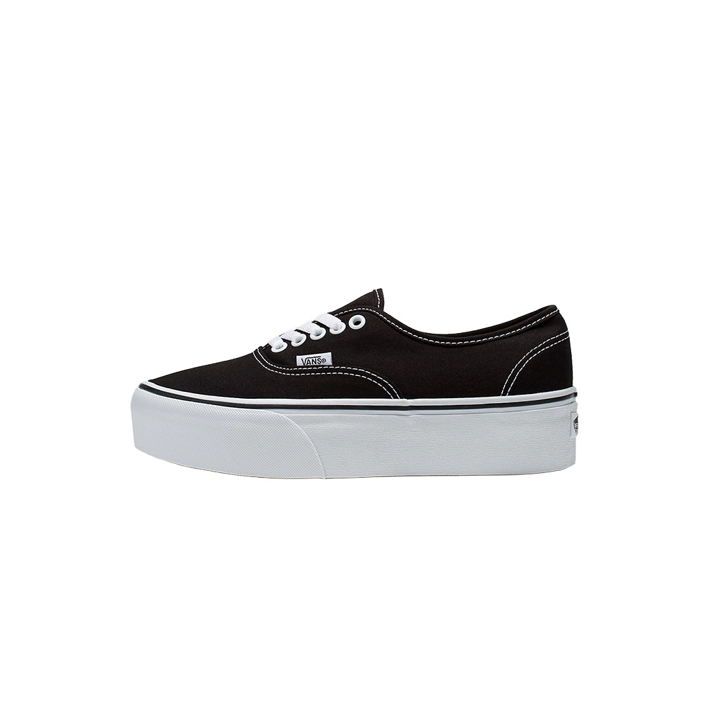 Black sneaker with white sole on a white background