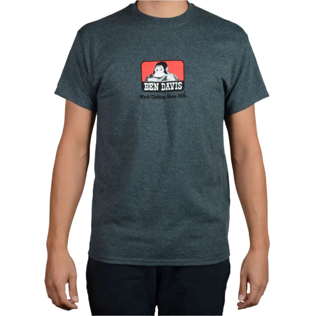 A person wearing a charcoal gray heather Ben Davis t-shirt with the brand's logo on the chest.