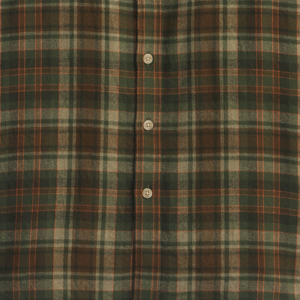 Plaid fabric with green, brown, and beige colors