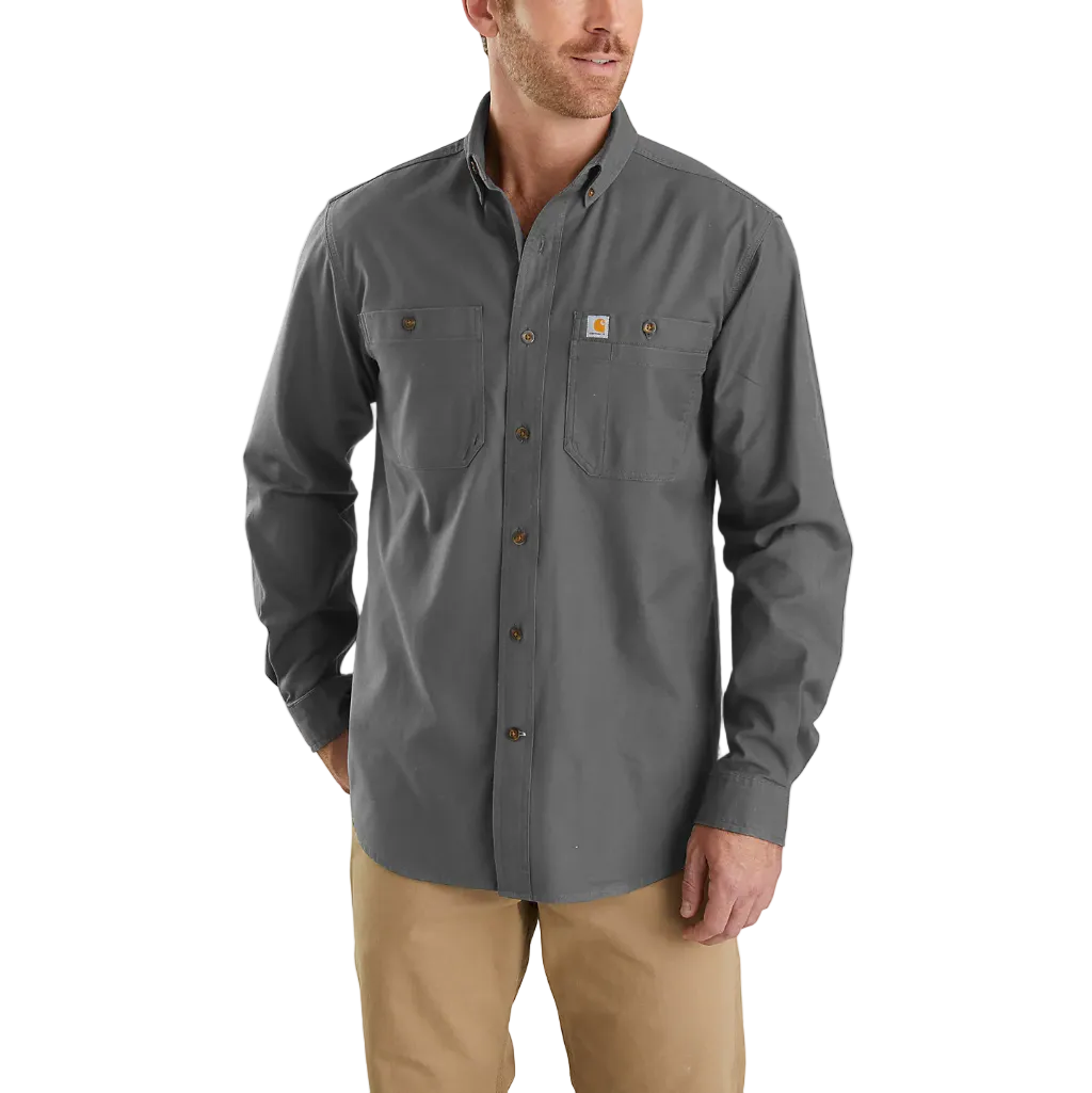 Man wearing a gray button-up shirt with a visible brand logo on a white background