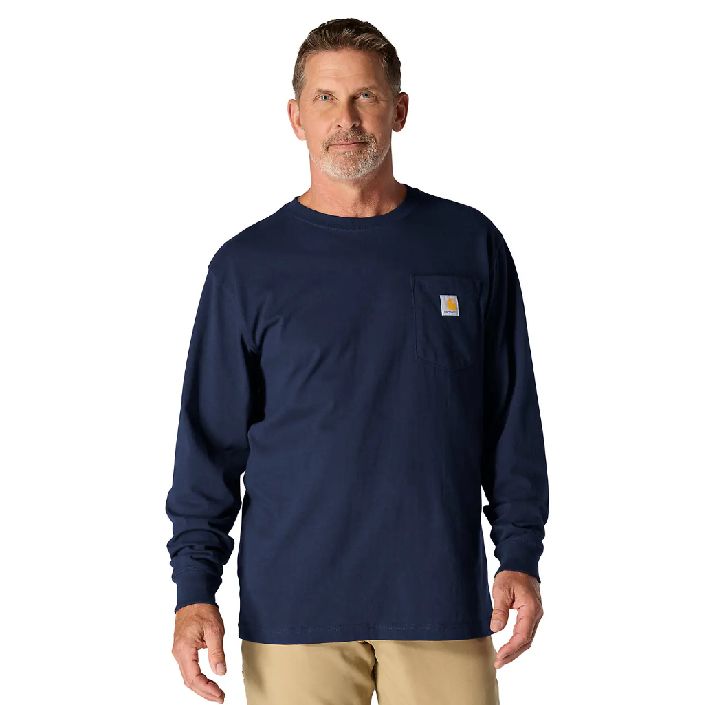 Man wearing a navy long-sleeve shirt with a brand logo on a white background