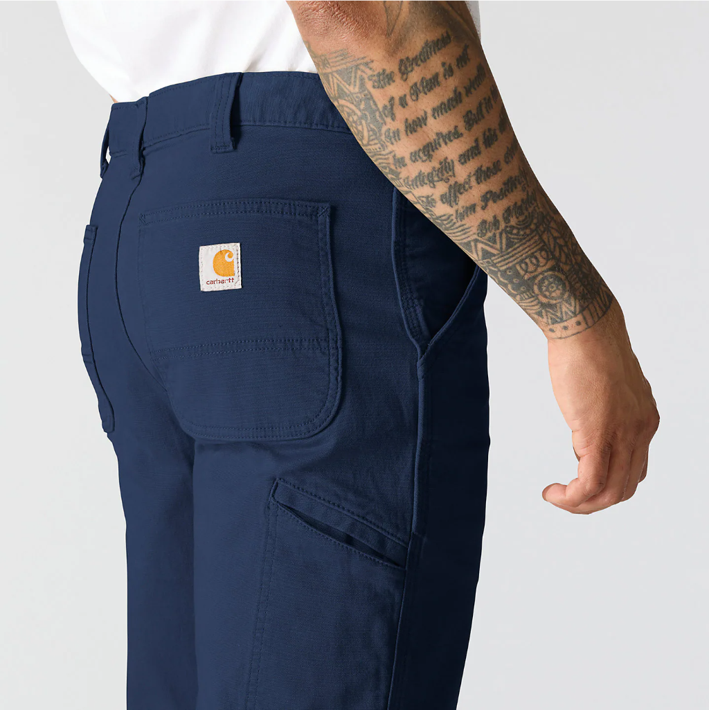 Navy blue pants with Carhartt logo on a plain background