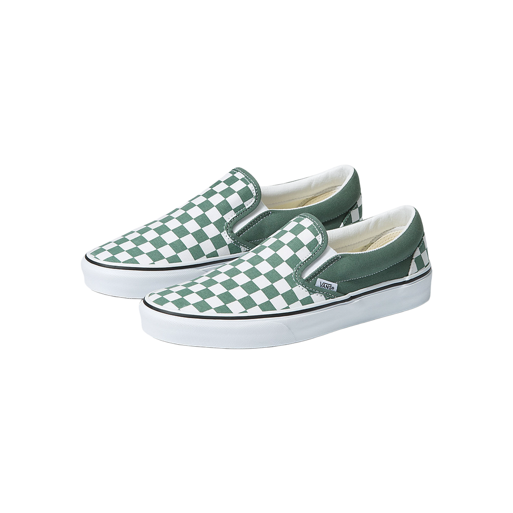 Green and white checkered slip-on shoes on a white background