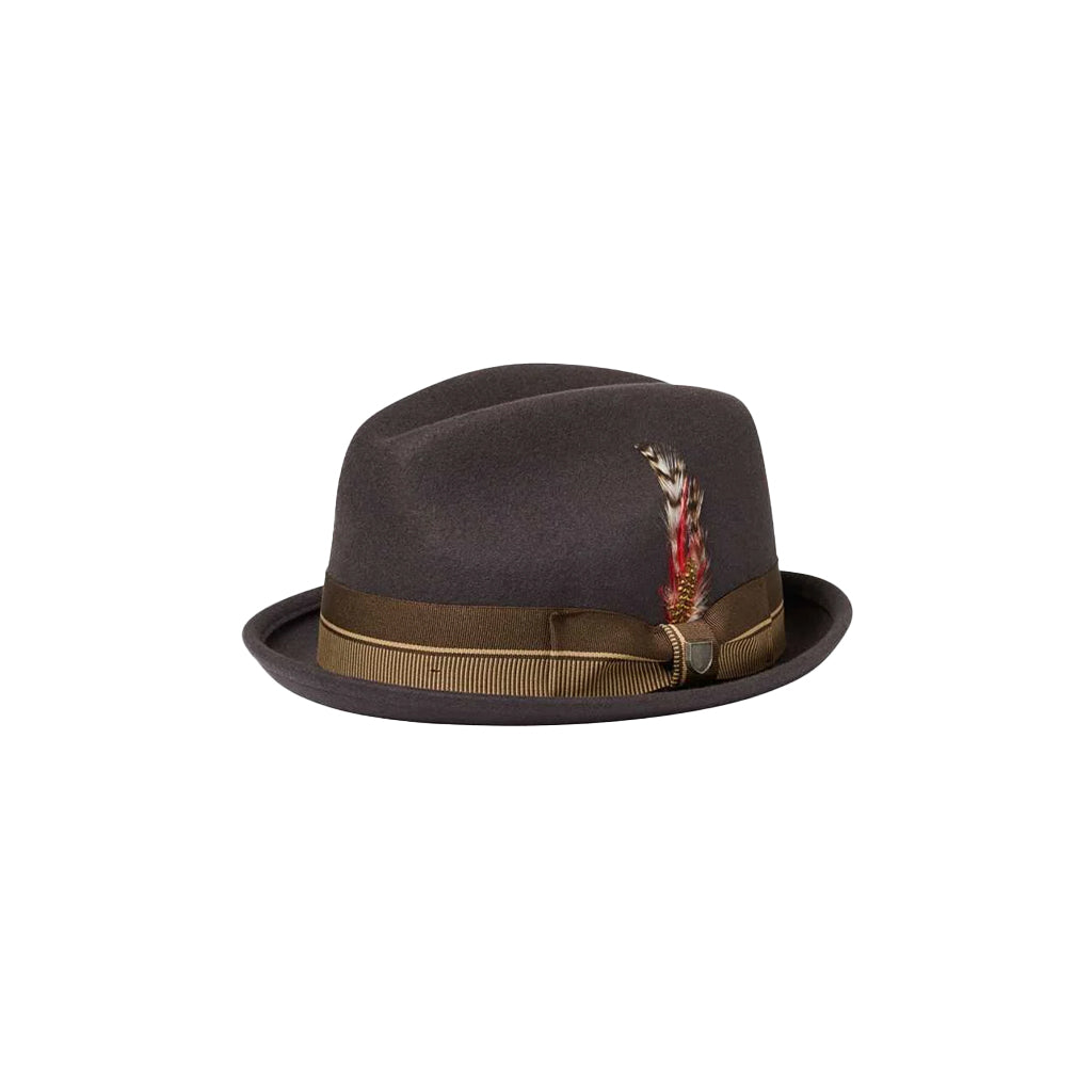 A brown felt-brimmed fedora hat with a gold and black striped band and a feather decoration.