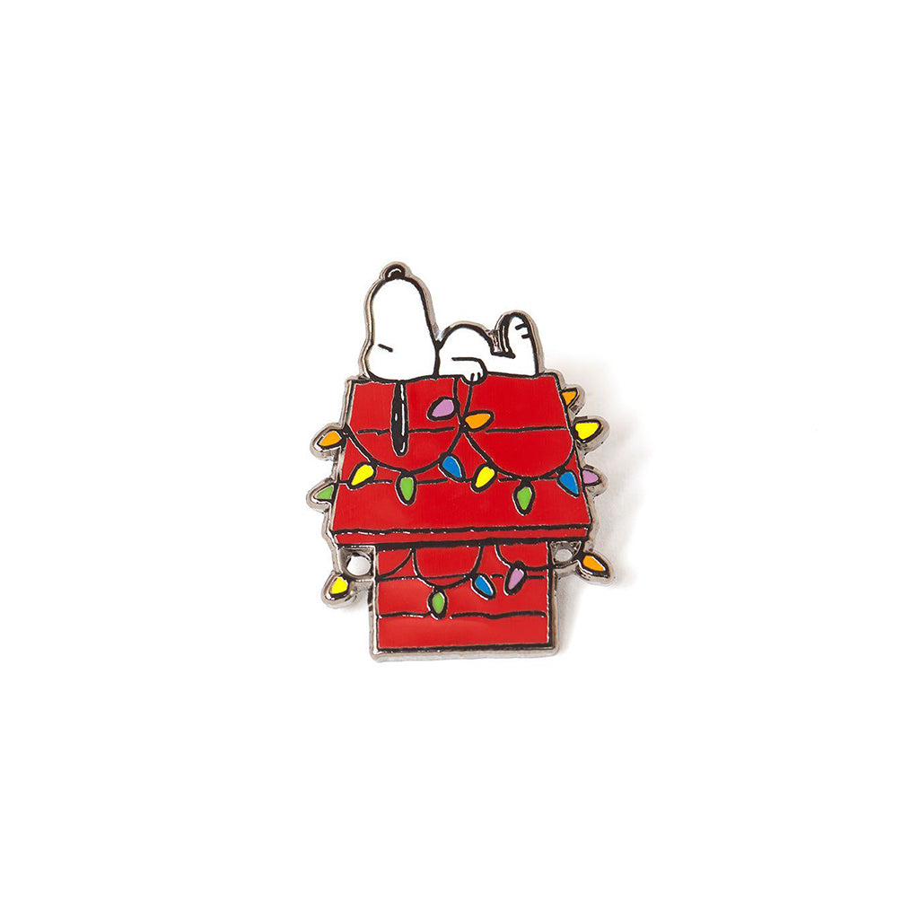 Snoopy in a red house with Christmas lights on a white background