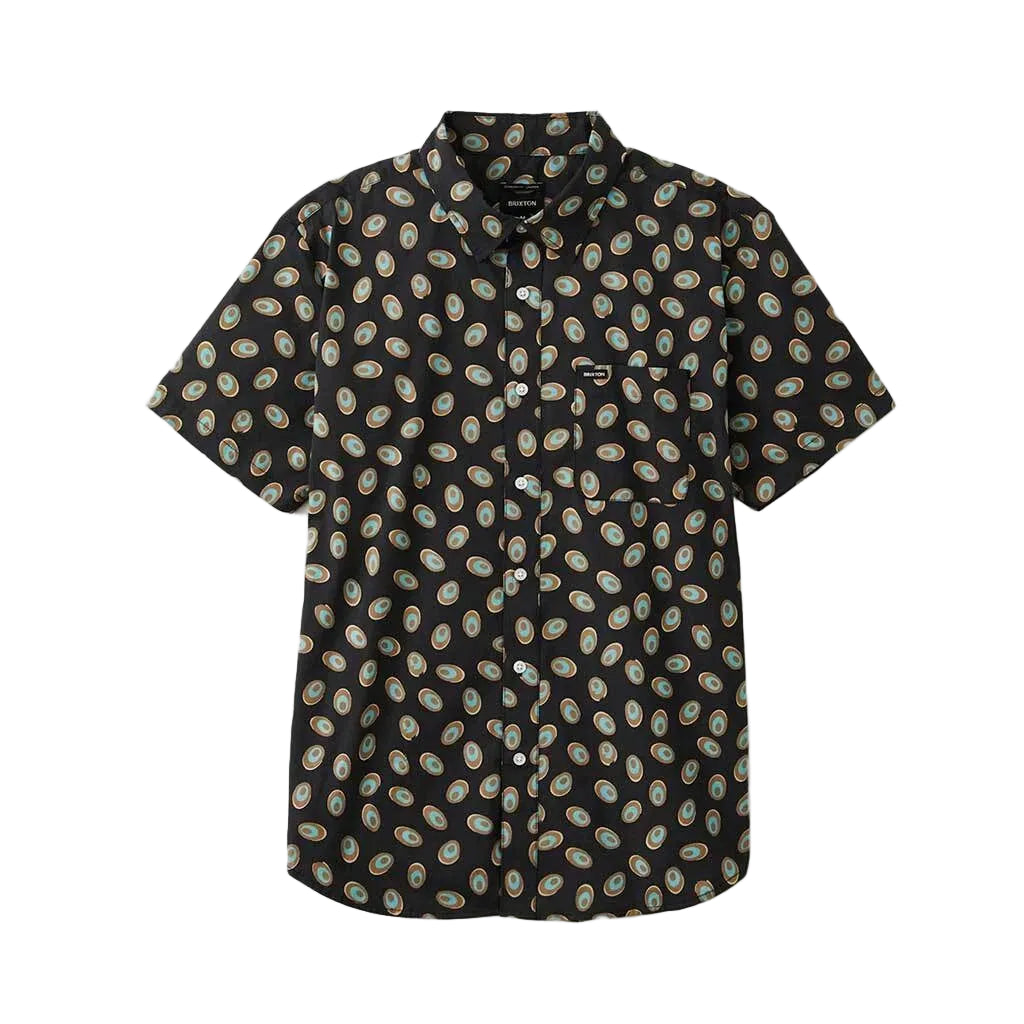 A short-sleeve button-up shirt with a black base and an all-over paisley pattern in beige, green, and brown, displayed flat against a white background.