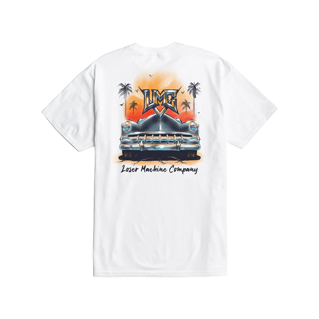 White crew neck t-shirt with a graphic print on the front featuring an illustration of a train and palm trees against a sunset backdrop.