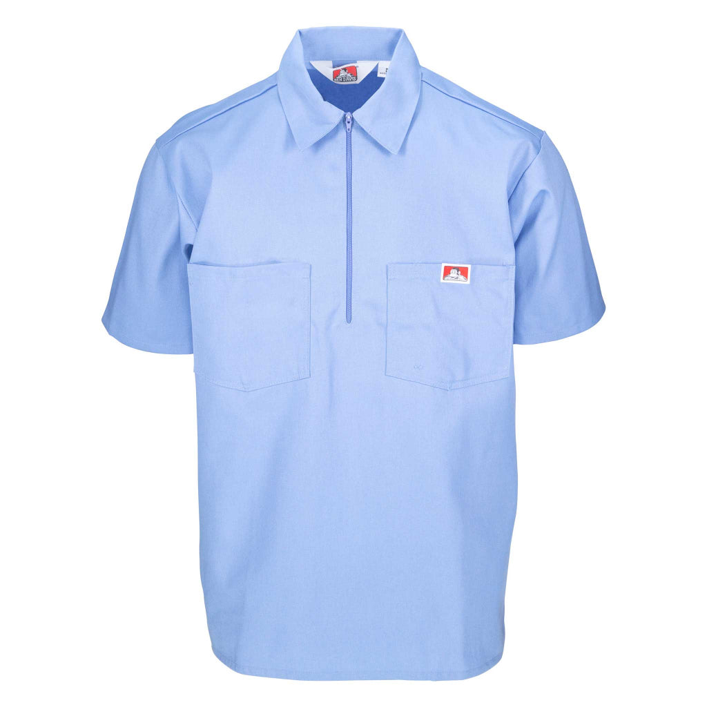 A short sleeve light blue shirt with a half zipper and two chest pockets.