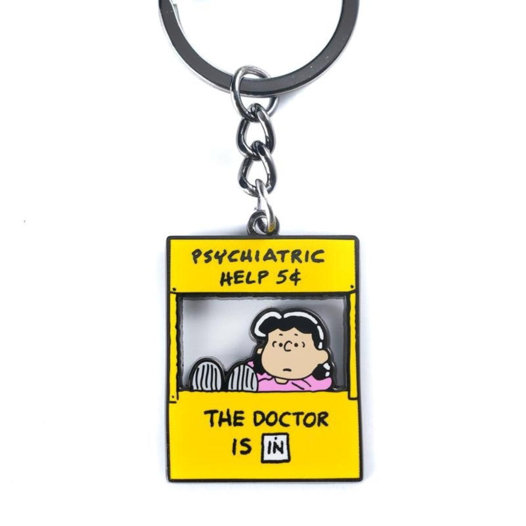 Keychain with cartoon design and text on a white background