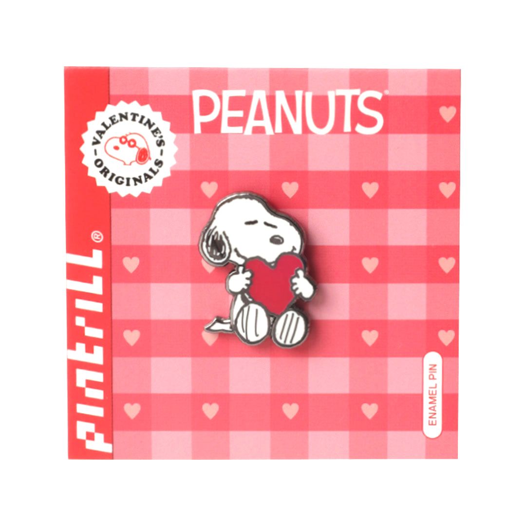 Snoopy holding a red heart on pink packaging 