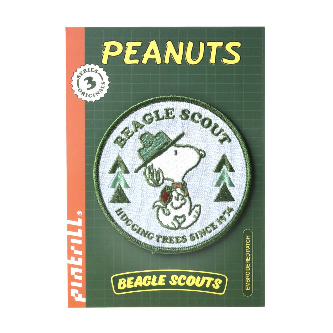 Peanuts-themed beagle scout patch on a green card with 'Peanuts' branding.