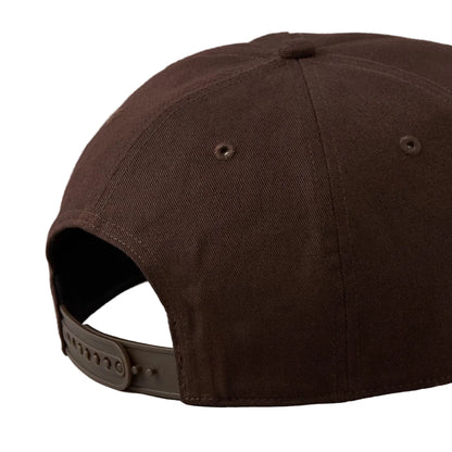 Brown cap on a white background
