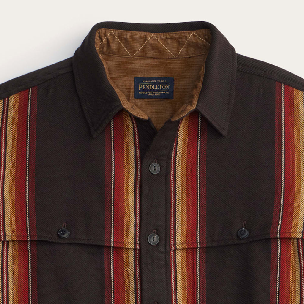 Close-up of a Pendleton shirt with striped pattern and brown collar