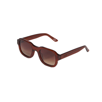 Brown sunglasses with a gradient lens on a white background
