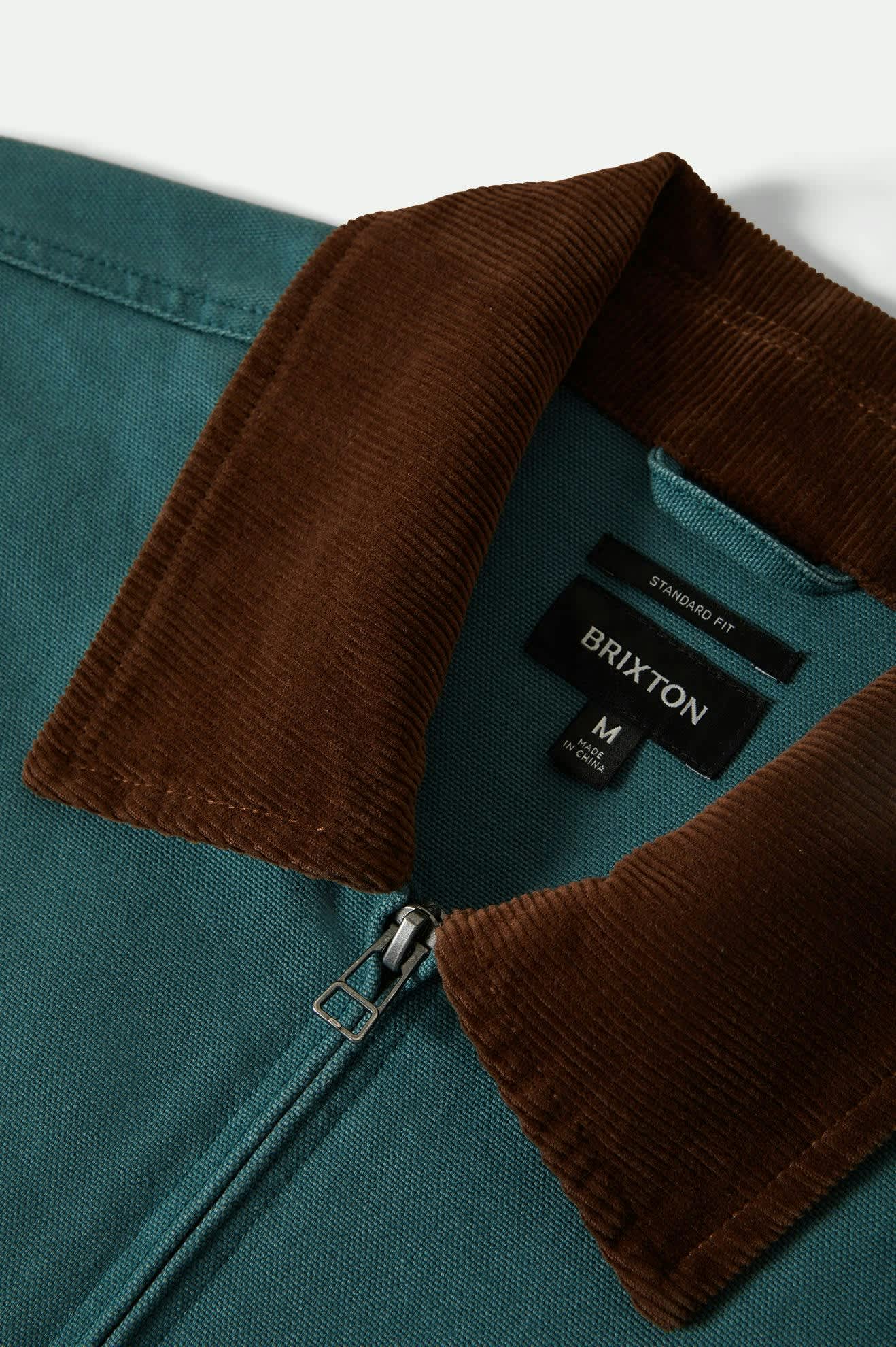 Teal jacket with brown corduroy collar and Brixton label