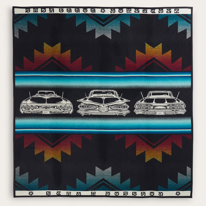 Blanket with vintage car design and geometric pattern on a black background