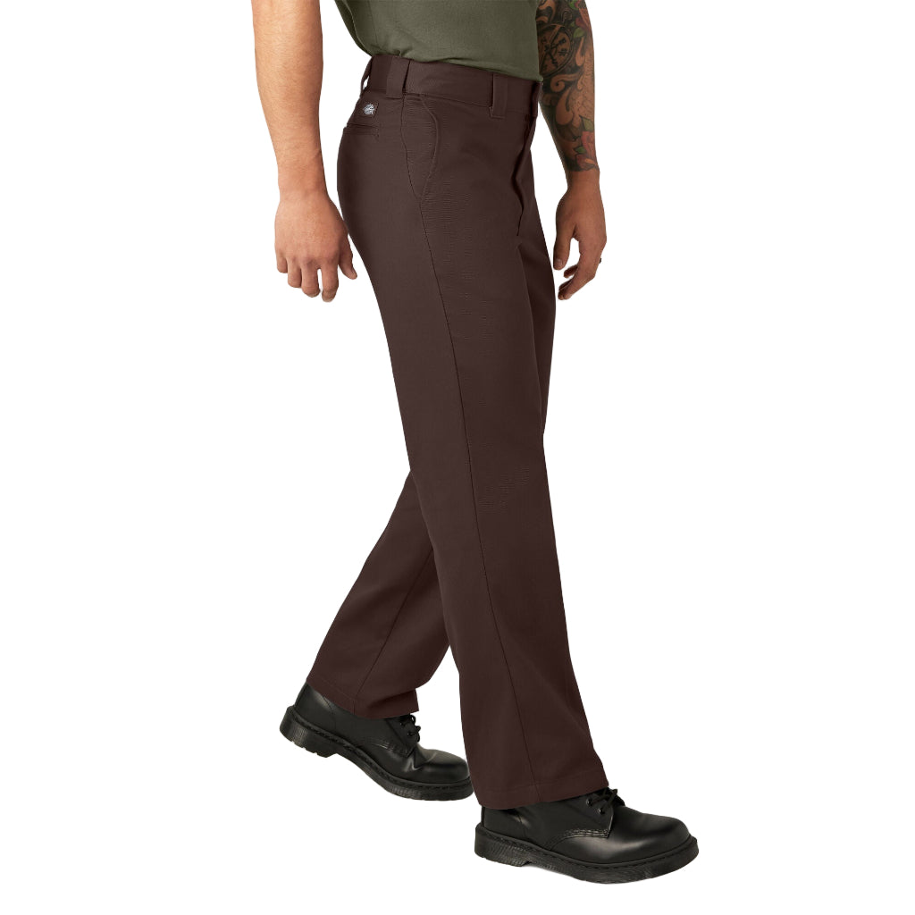 Brown pants worn by a person on a white background