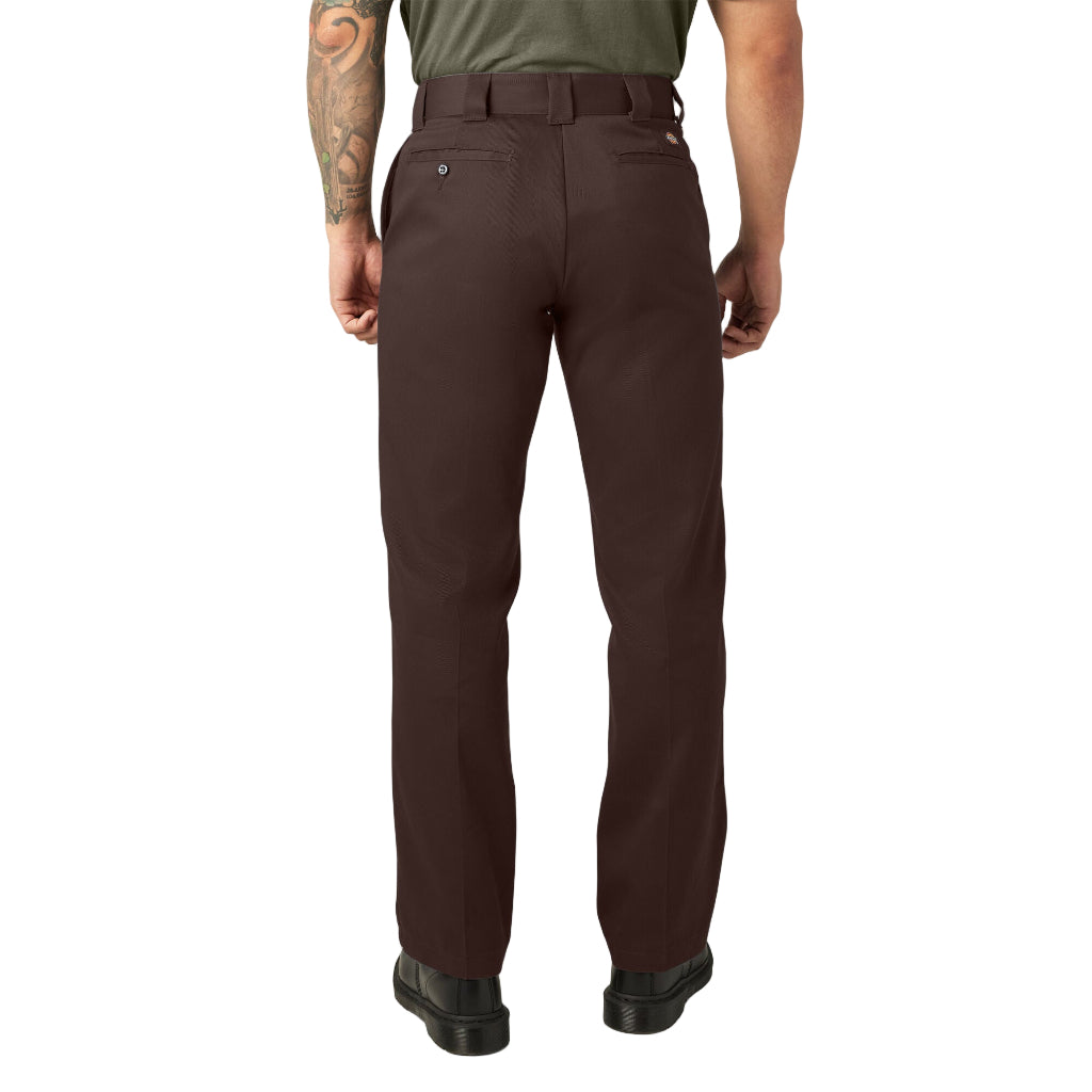 Brown pants worn by a person on a white background