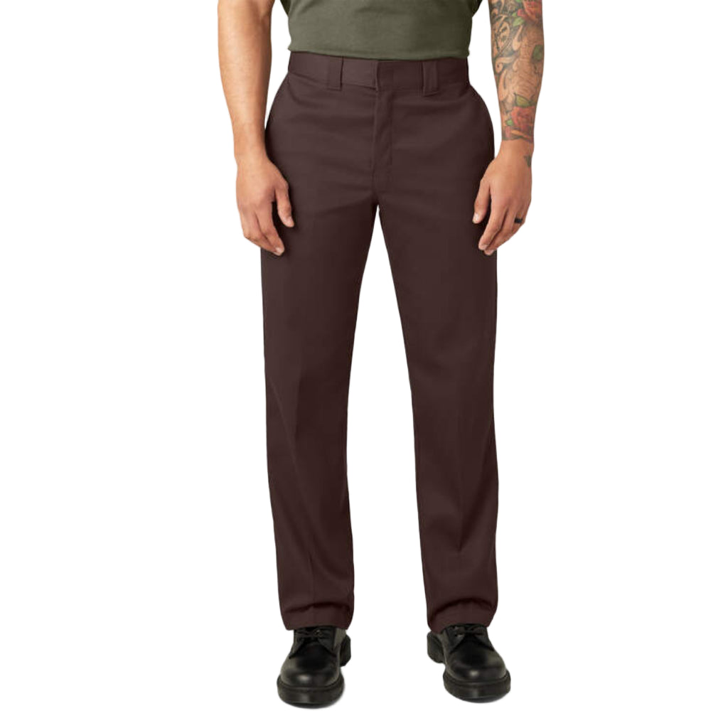 Person wearing brown pants on a white background