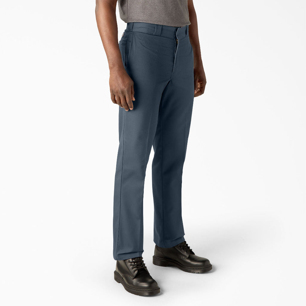 Person wearing blue pants on a white background
