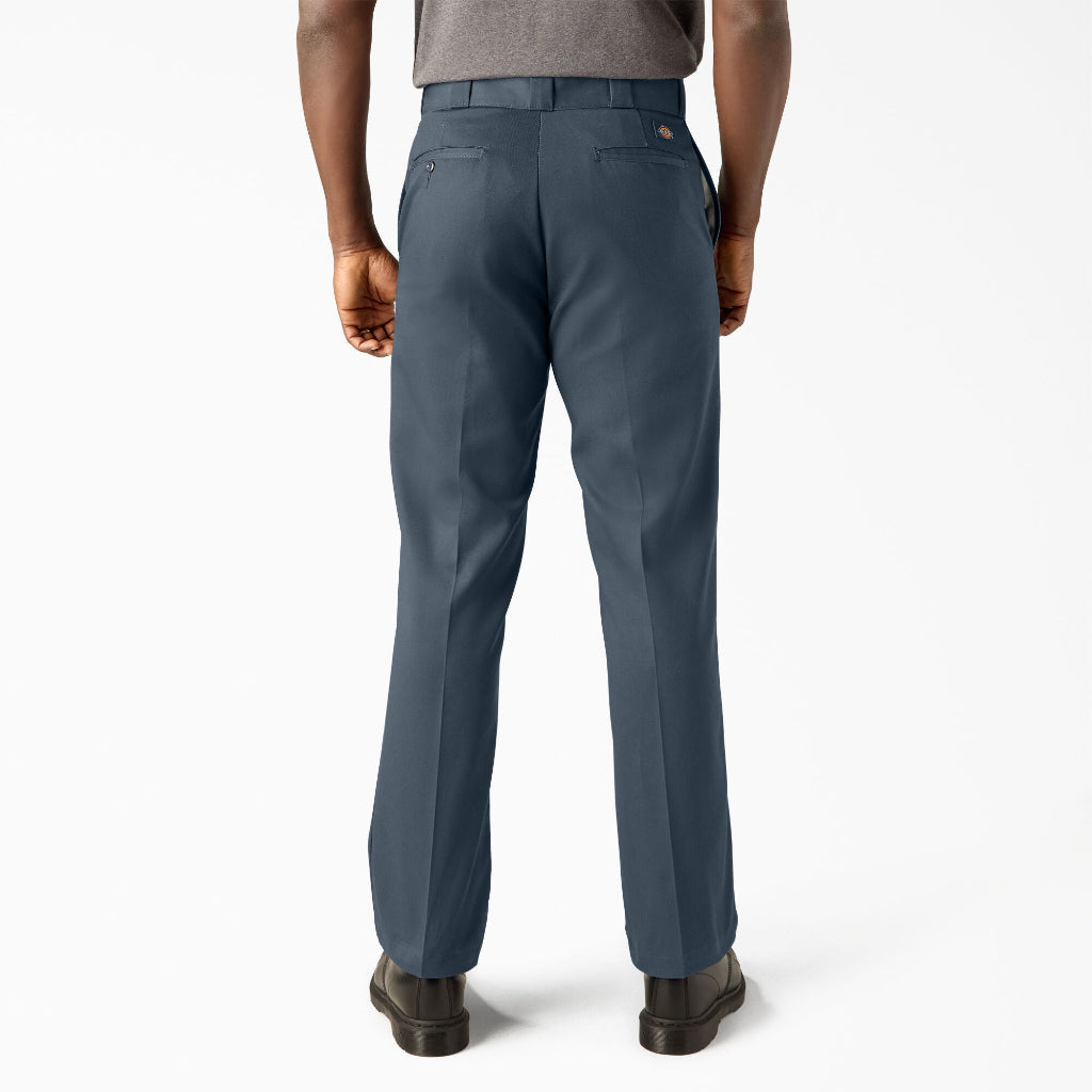 Person wearing blue pants on a white background