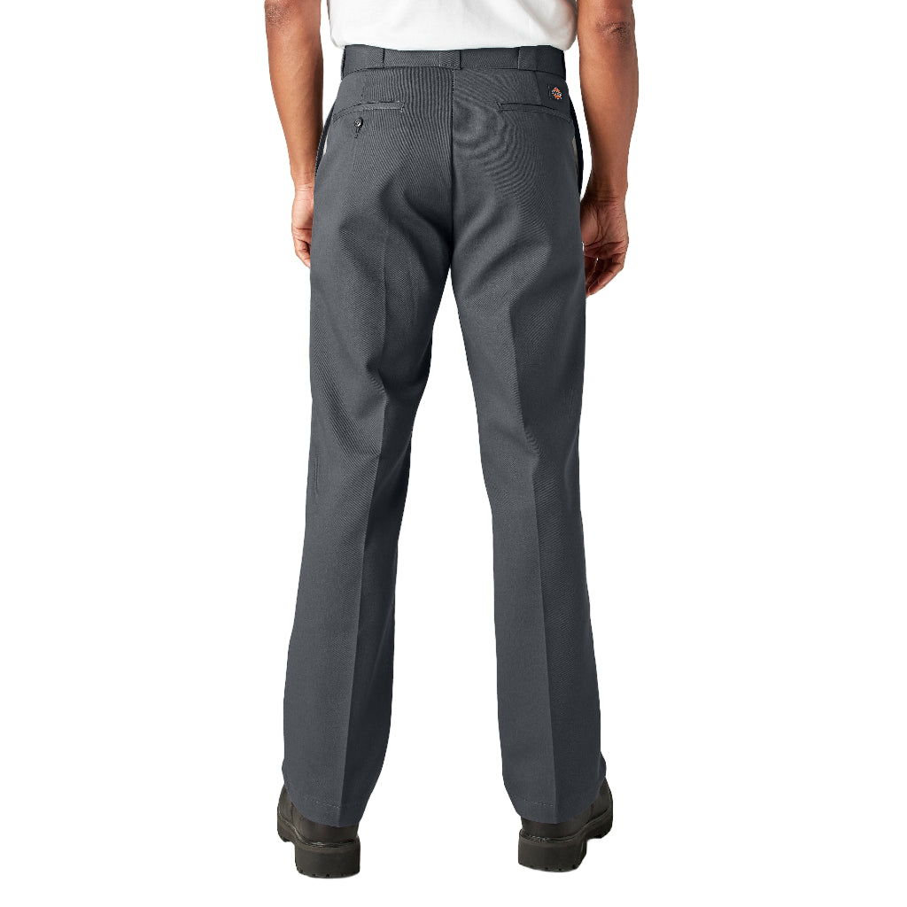 Person wearing gray pants on a white background