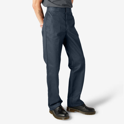 Person wearing dark navy pants on a white background