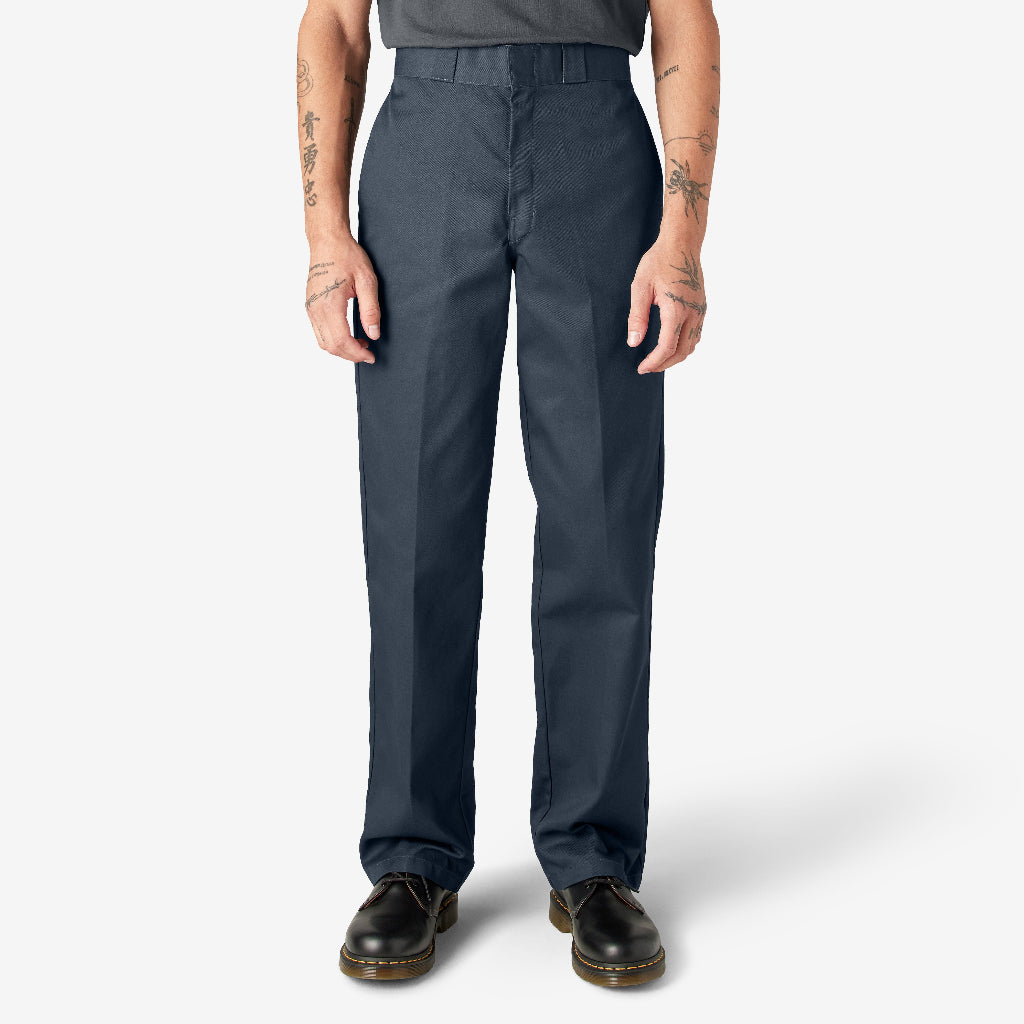 Person wearing dark navy pants on a white background