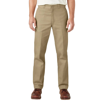 Beige pants worn by a person on a white background
