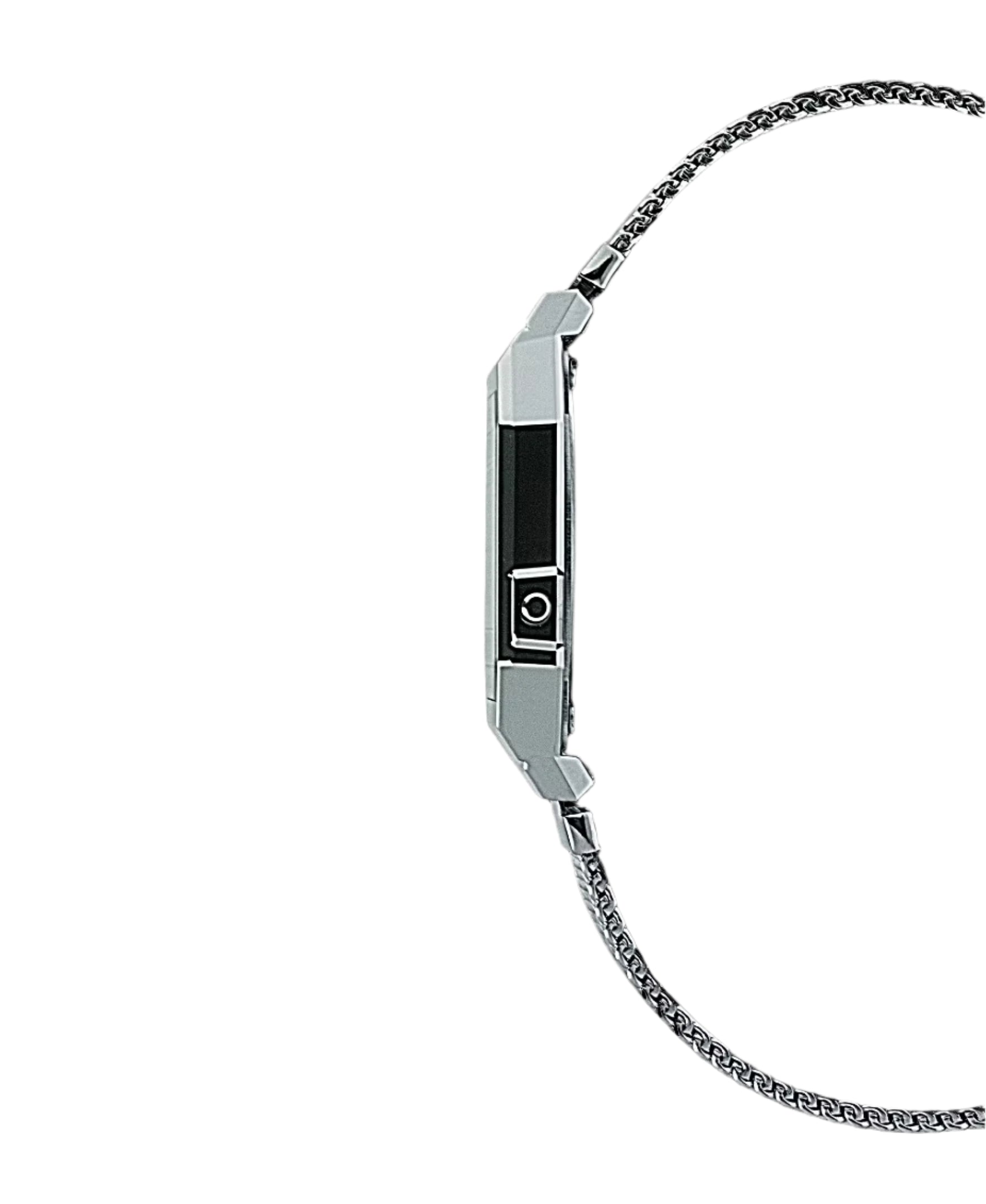 Silver bracelet with a mesh design on a white background