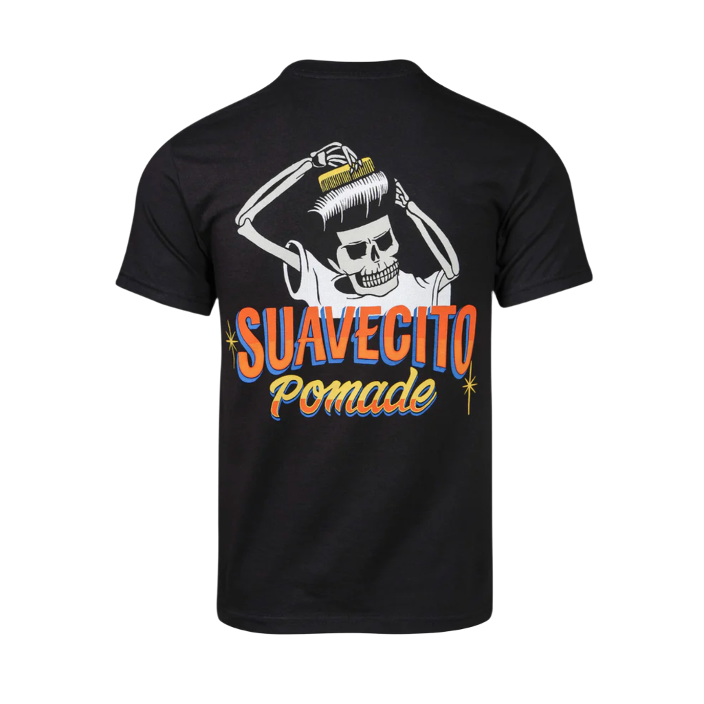 Black t-shirt with custom artwork featuring a skull and the text 'SUAVEGITO Pomade' in orange and yellow.
