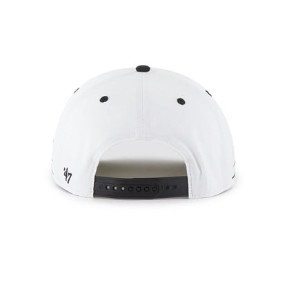 White cap with black accents on a white background