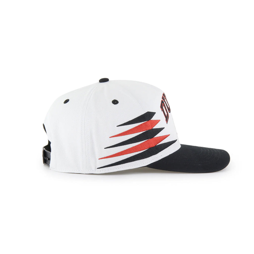 White cap with black and red design on a white background