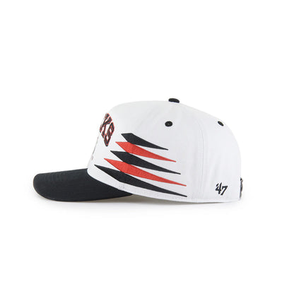 Black and white cap with red and black design on a white background