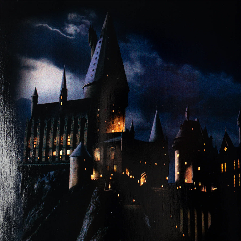 Fantasy castle at night with lightning in the sky