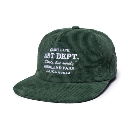 Green cap with white text on a white background