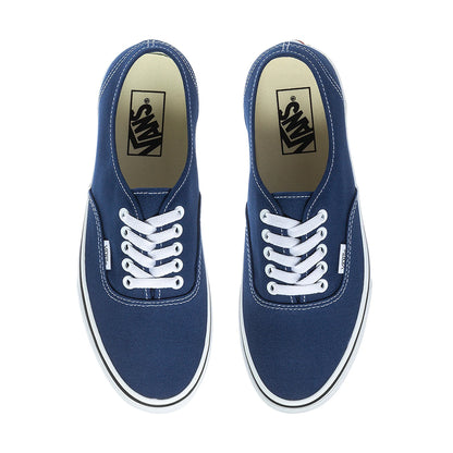 Pair of blue sneakers with white laces on a white background