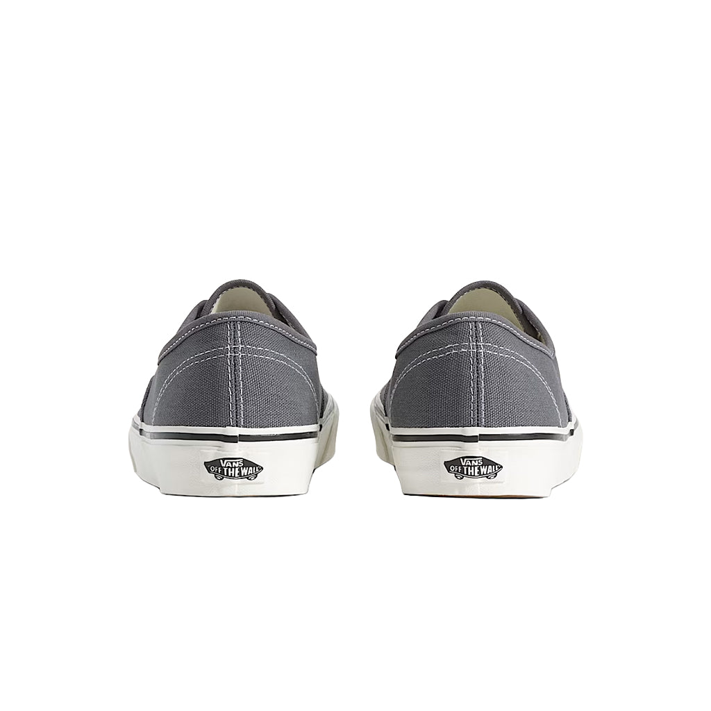 Gray sneakers with white soles on a white background