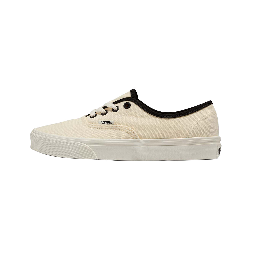 White sneaker with black accents on a white background